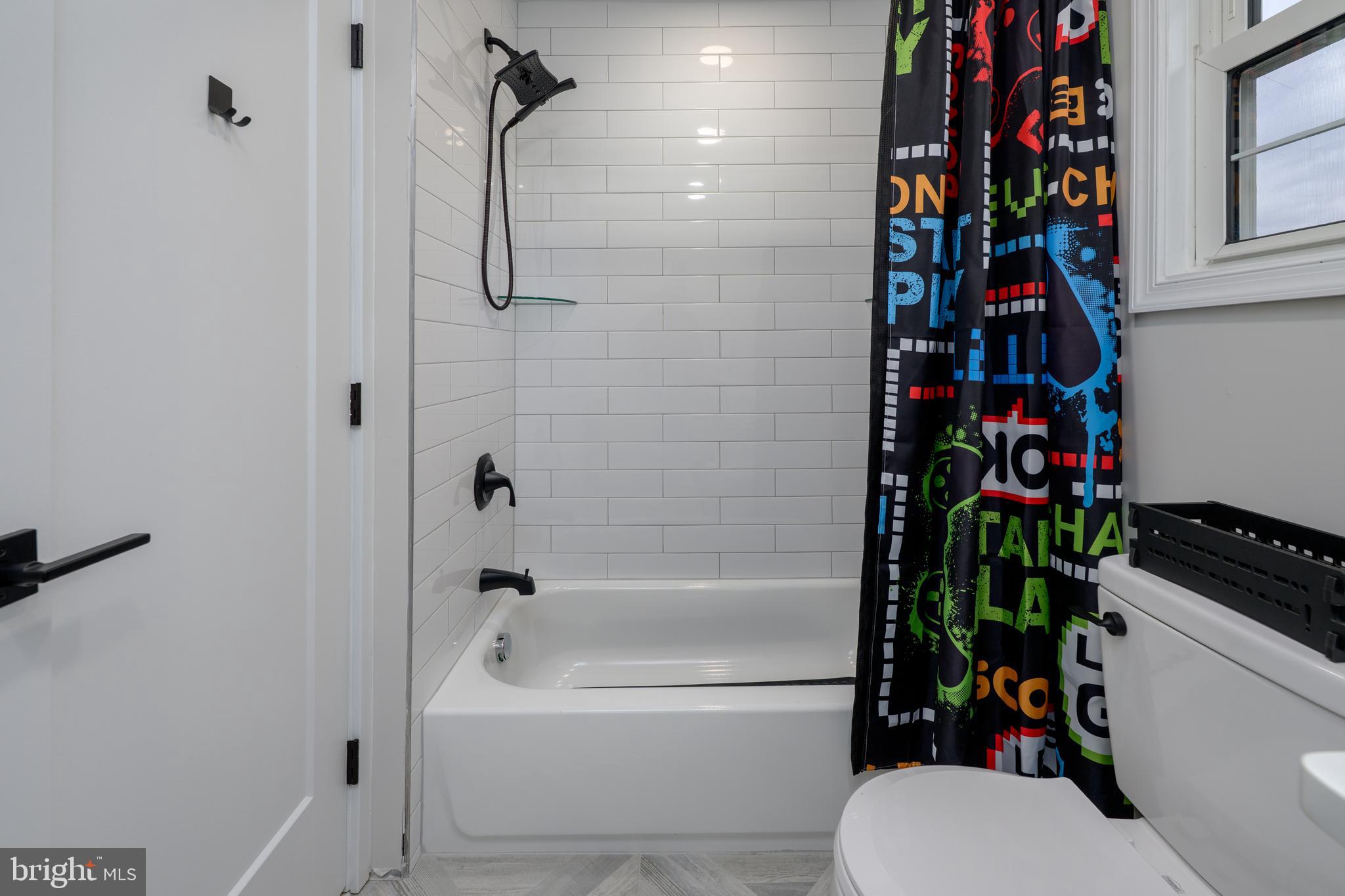 3 Drake Terrace Sewell, NJ 08080 - Photo 28 of 34 a bathroom with a bathtub and a shower