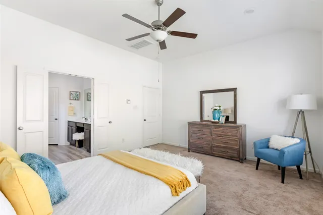 a bathroom with a shower and a sink