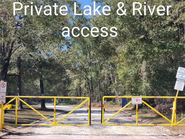 a view of a swimming pool with a yard
