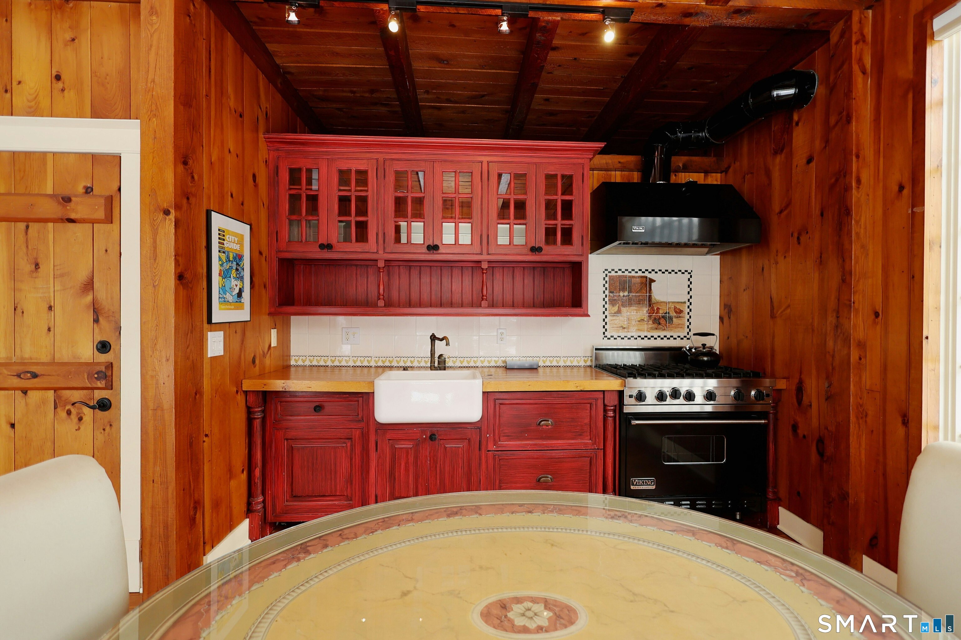 369 Florida Hill Road Ridgefield, CT 06877 - Photo 3 of 35 a kitchen with stainless steel appliances granite countertop a stove top oven a sink dishwasher and a microwave oven with cabinets