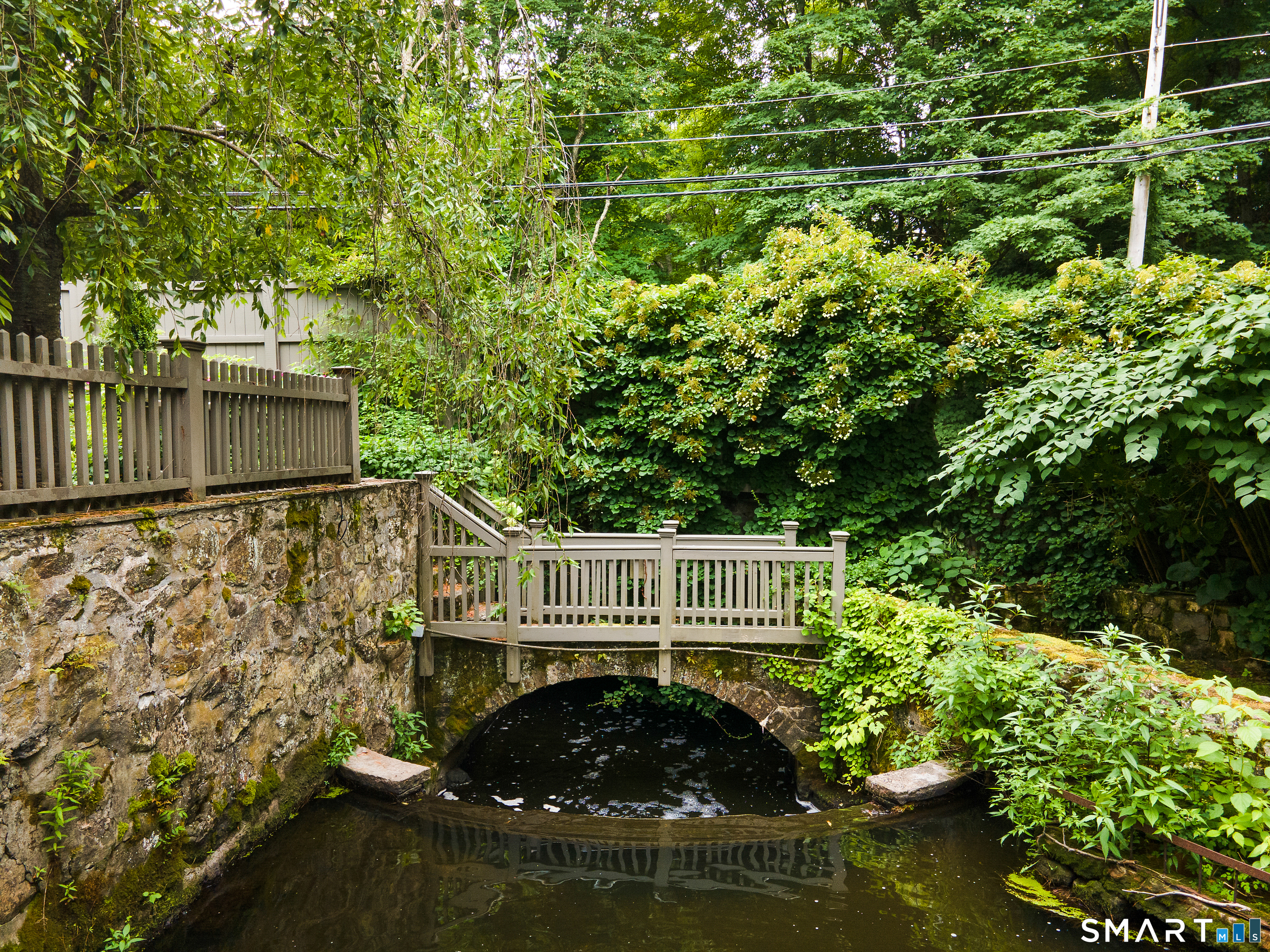 369 Florida Hill Road Ridgefield, CT 06877 - Photo 33 of 35 a balcony with trees in front of it