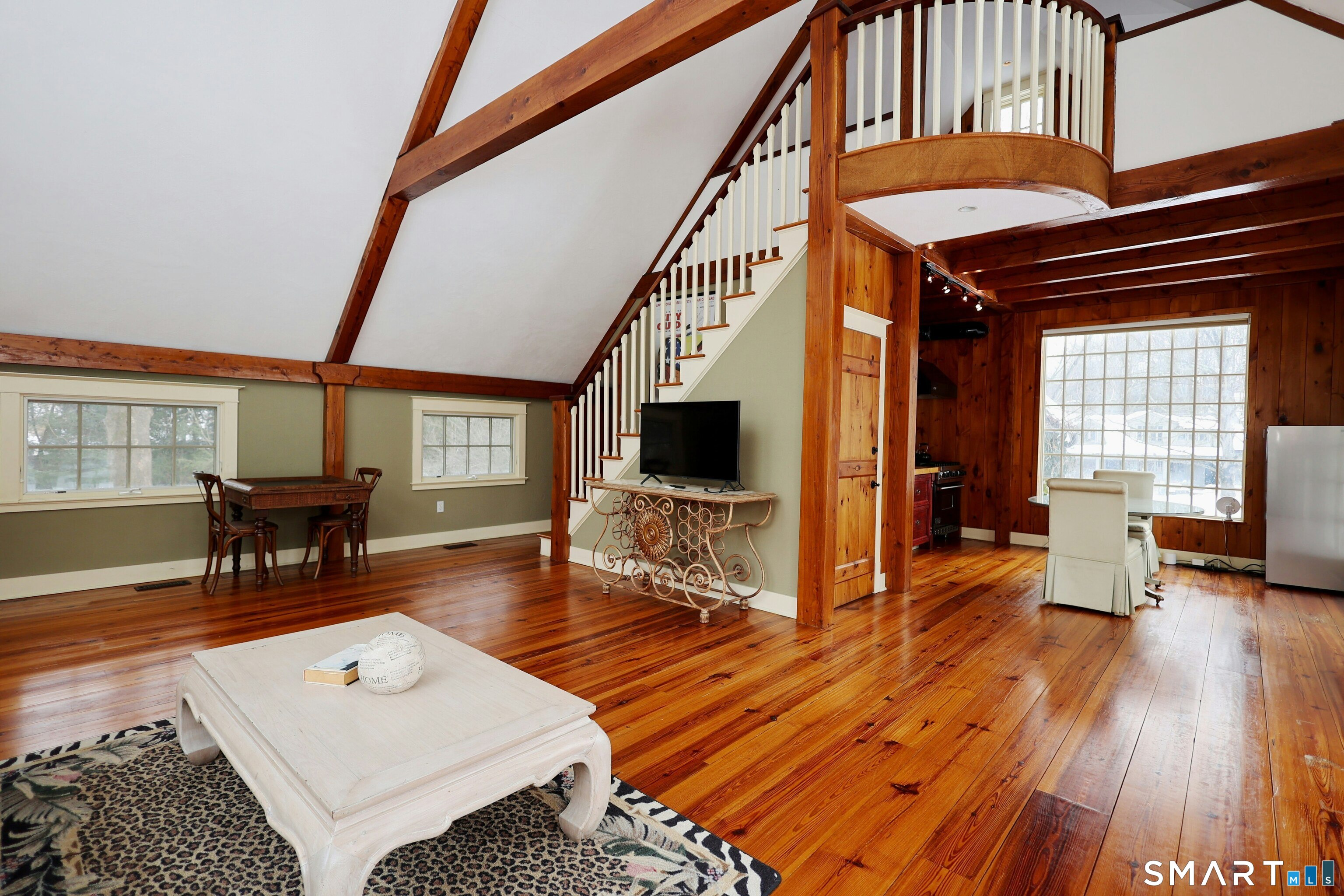 369 Florida Hill Road Ridgefield, CT 06877 - Photo 4 of 35 a living room with furniture a fireplace and a table