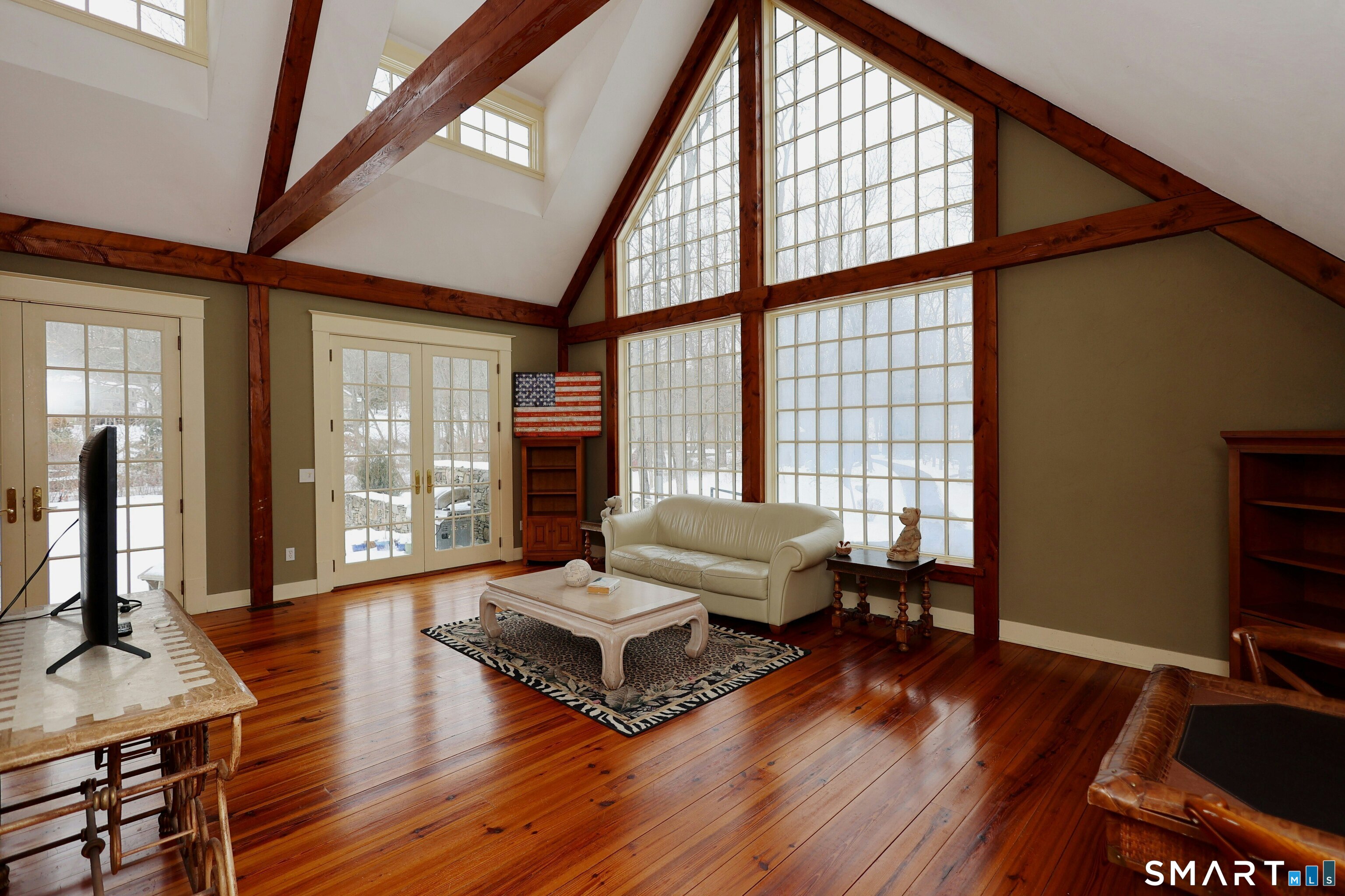 369 Florida Hill Road Ridgefield, CT 06877 - Photo 5 of 35 a living room with furniture and floor to ceiling windows
