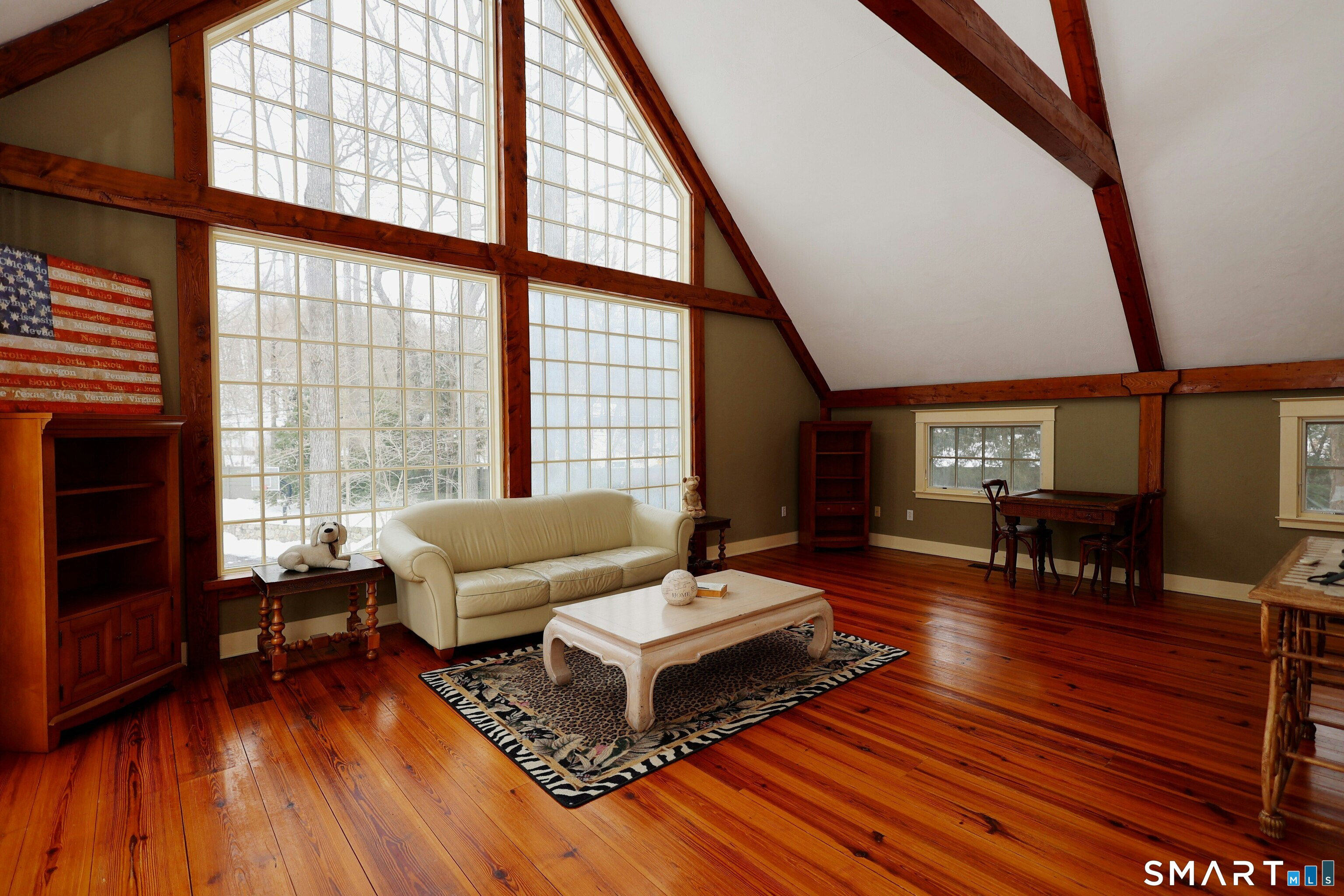 369 Florida Hill Road Ridgefield, CT 06877 - Photo 7 of 35 a living room with furniture and a wooden floor