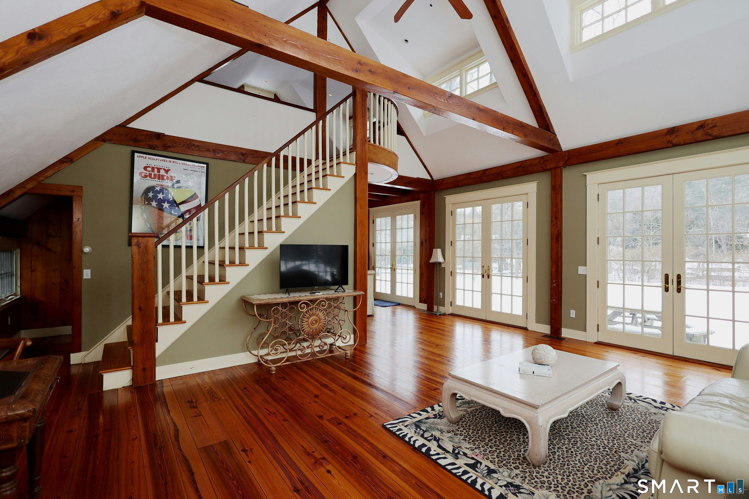 369 Florida Hill Road Ridgefield, CT 06877 - Photo 8 of 35 a living room with furniture wooden floor and large windows