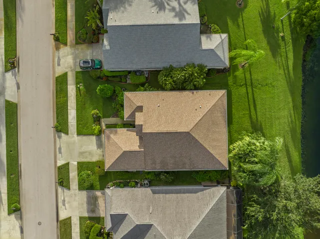 an aerial view of a house with a garden