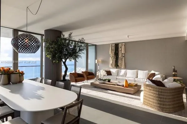 a living room with furniture and window