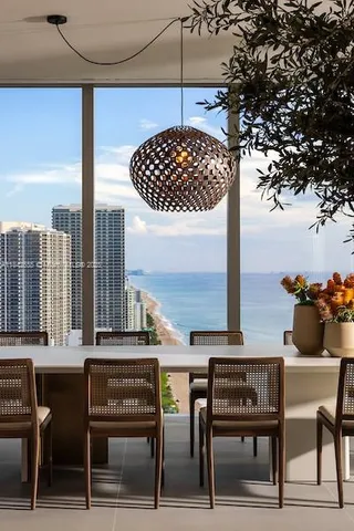 a view of a chairs and table in the patio