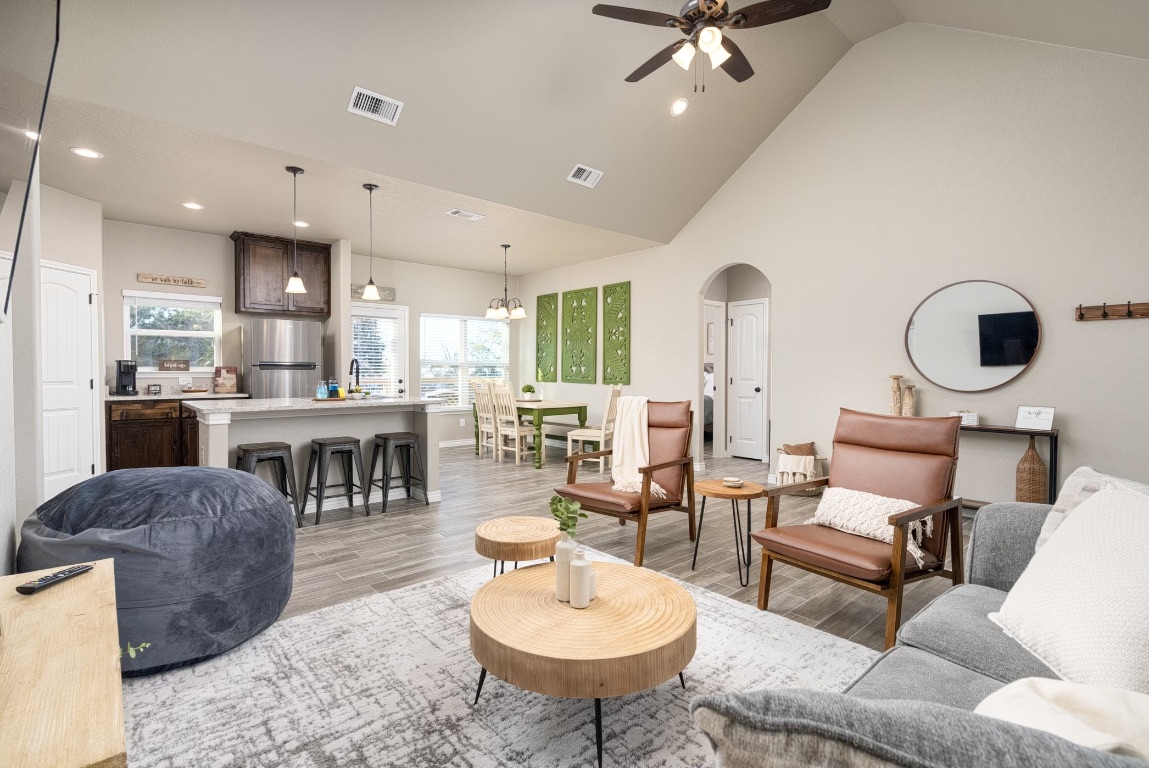 117 Lightning Bolt Spring Branch, TX 78070 - Photo 3 of 12 a living room with furniture a rug and white walls