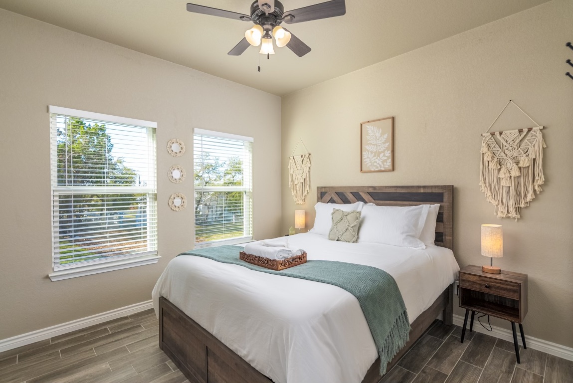 117 Lightning Bolt Spring Branch, TX 78070 - Photo 9 of 12 a bedroom with a bed and a window