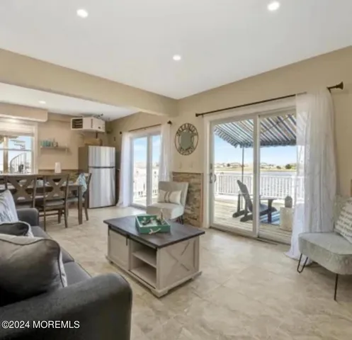 a living room with furniture and a table