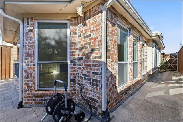 a view of a house with a large window