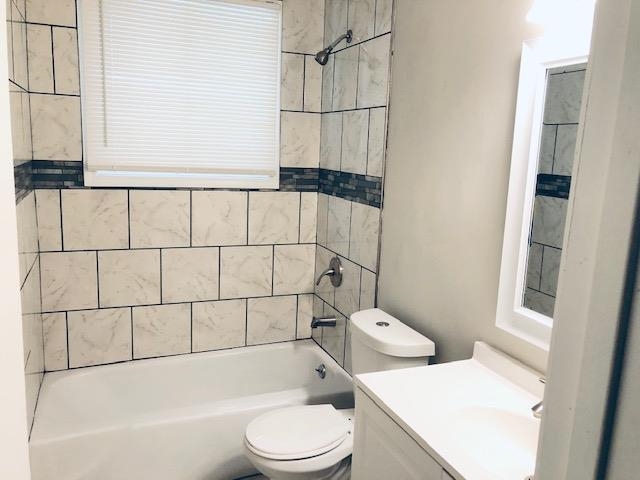 1419 Whitten Road Memphis, TN 38134 - Photo 22 of 22 a bathroom with a toilet and a shower