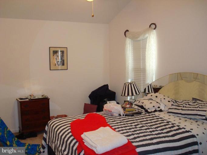 6149 Good Hunters Ride Columbia, MD 21045 - Photo 12 of 30 a bedroom with a bed and a window