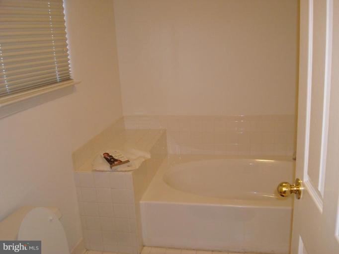 6149 Good Hunters Ride Columbia, MD 21045 - Photo 13 of 30 a close up of a bathtub