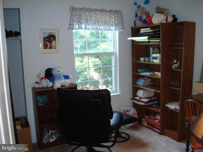 6149 Good Hunters Ride Columbia, MD 21045 - Photo 19 of 30 a living room with furniture and a window