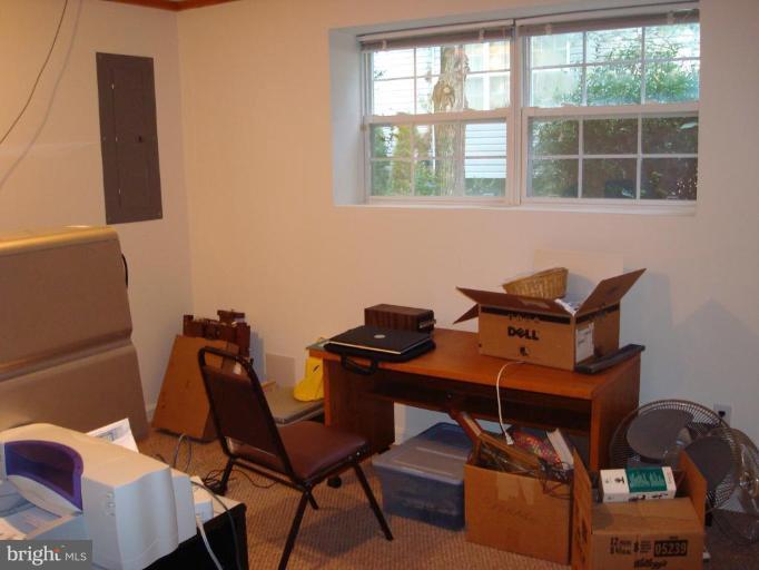 6149 Good Hunters Ride Columbia, MD 21045 - Photo 20 of 30 a view of a workspace with furniture and a window