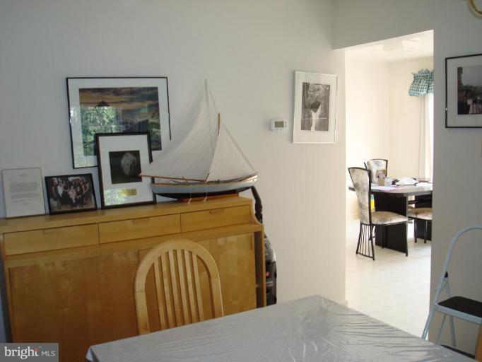 6149 Good Hunters Ride Columbia, MD 21045 - Photo 6 of 30 a bedroom with a bed and wooden floor