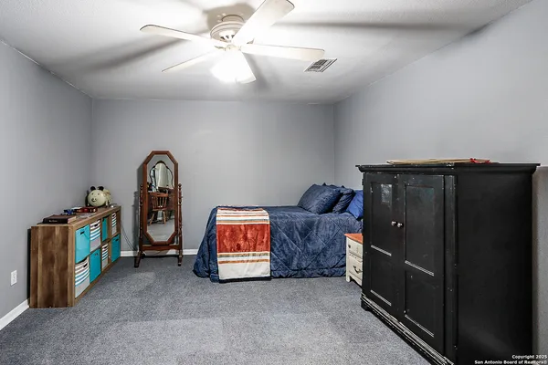 a room with furniture and a flat screen tv