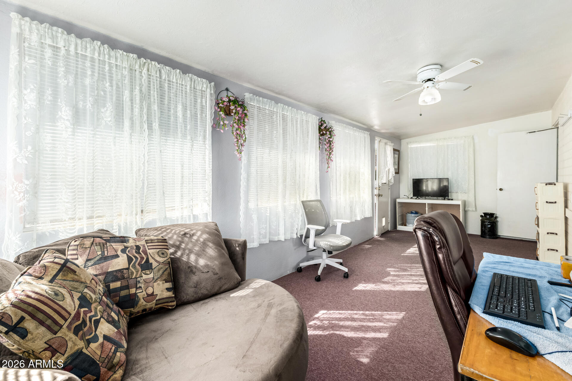 5519 Casper Road Mesa, AZ 85205 - Photo 11 of 23 a bedroom with furniture and a view