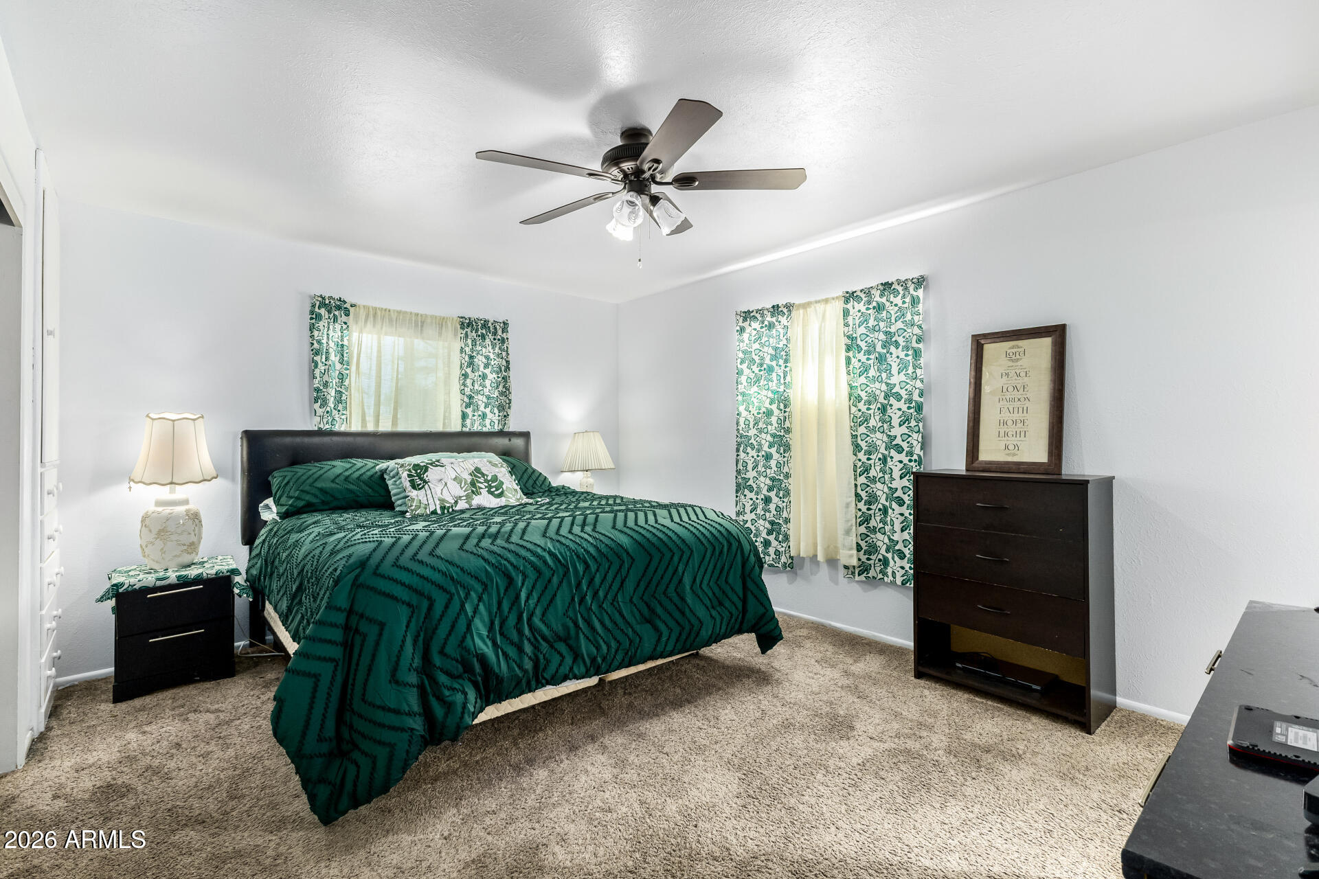5519 Casper Road Mesa, AZ 85205 - Photo 12 of 23 a bedroom with a bed and a window
