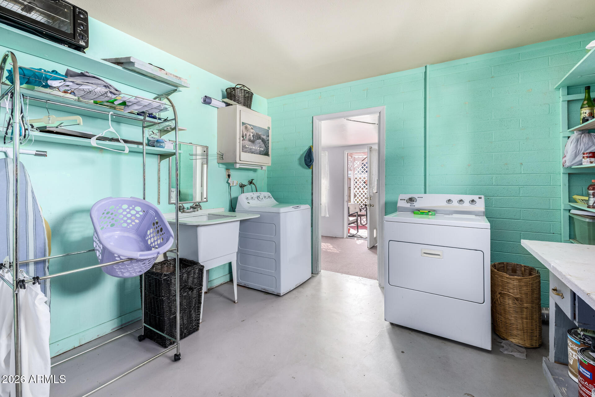 5519 Casper Road Mesa, AZ 85205 - Photo 19 of 23 a utility room with dryer and washer