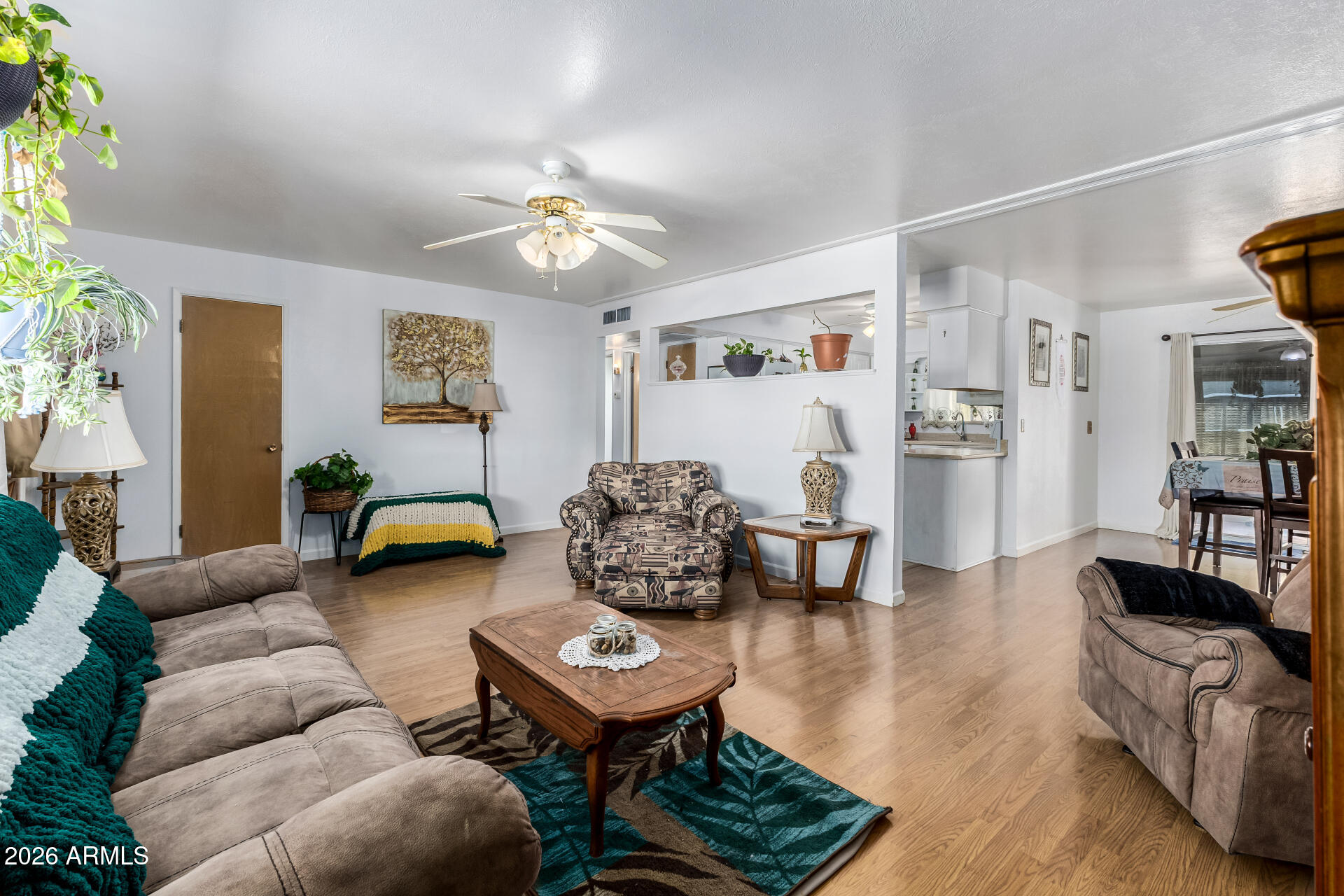 5519 Casper Road Mesa, AZ 85205 - Photo 5 of 23 a living room with furniture and wooden floor
