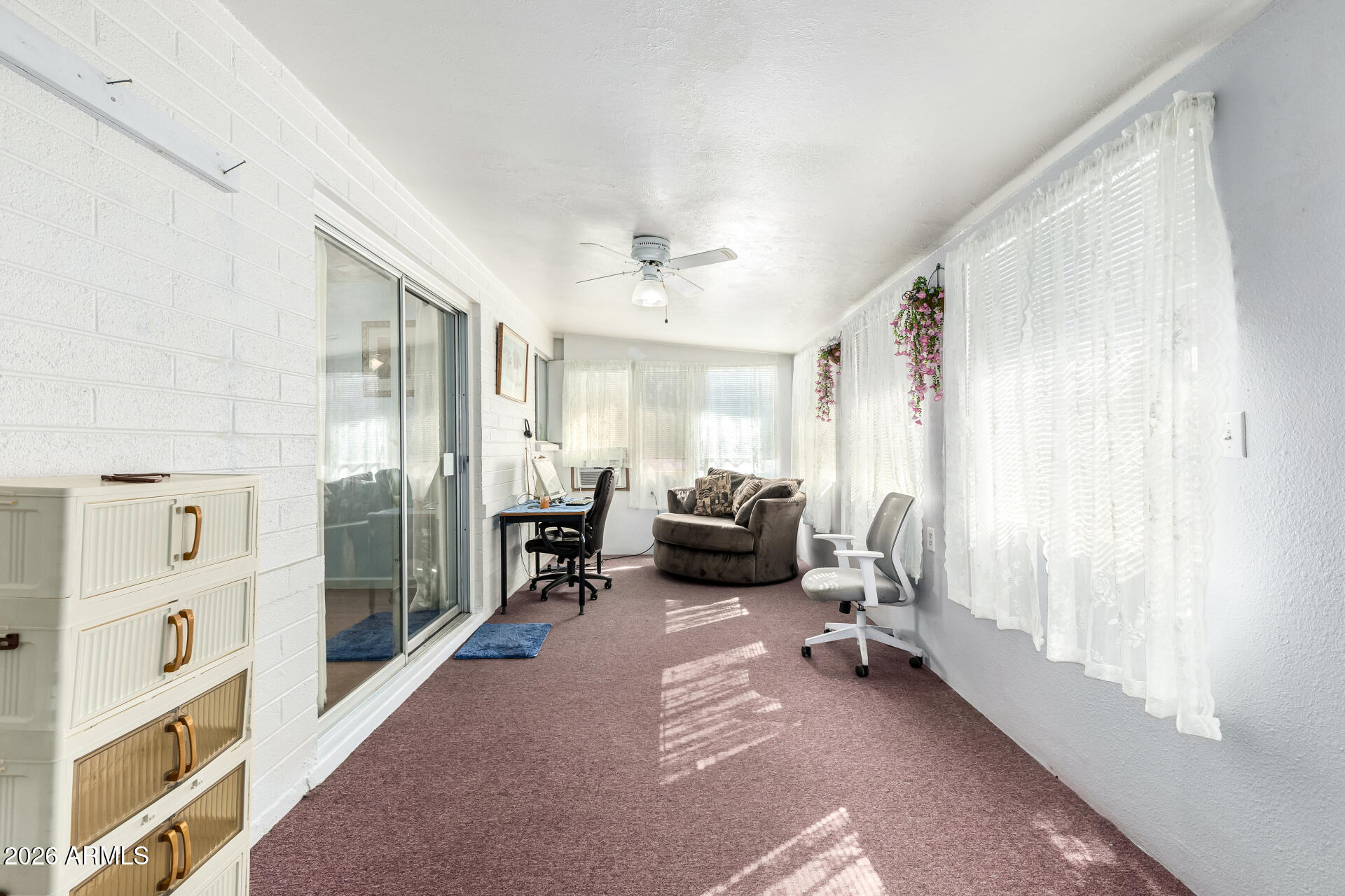 5519 Casper Road Mesa, AZ 85205 - Photo 10 of 23 a view of a livingroom with furniture and a window