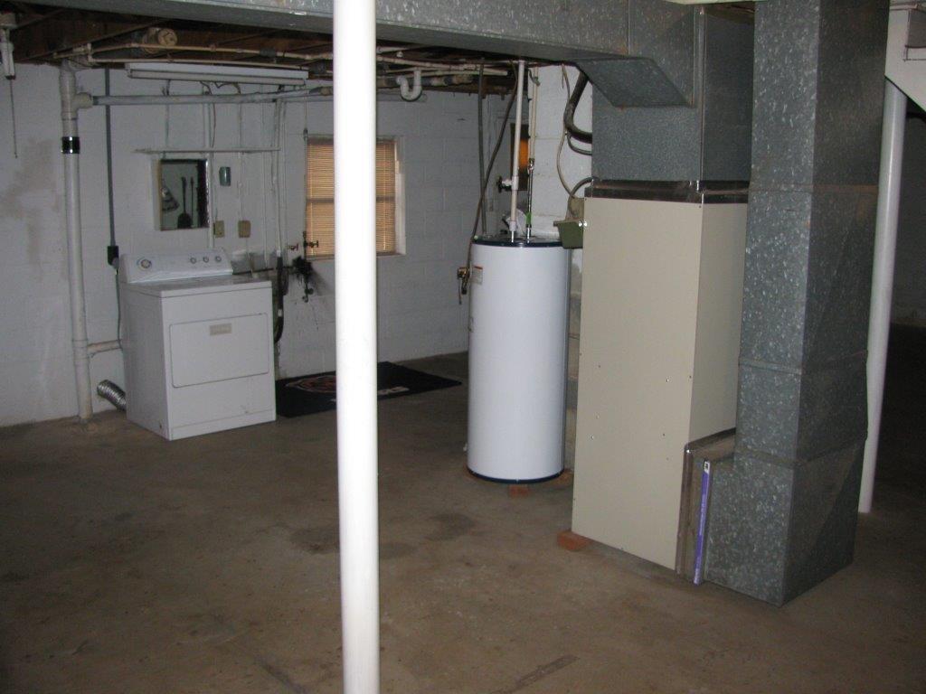 4348 Old Mine Road Gretna, VA 24557 - Photo 15 of 29 a view of two room with refrigerator and washer
