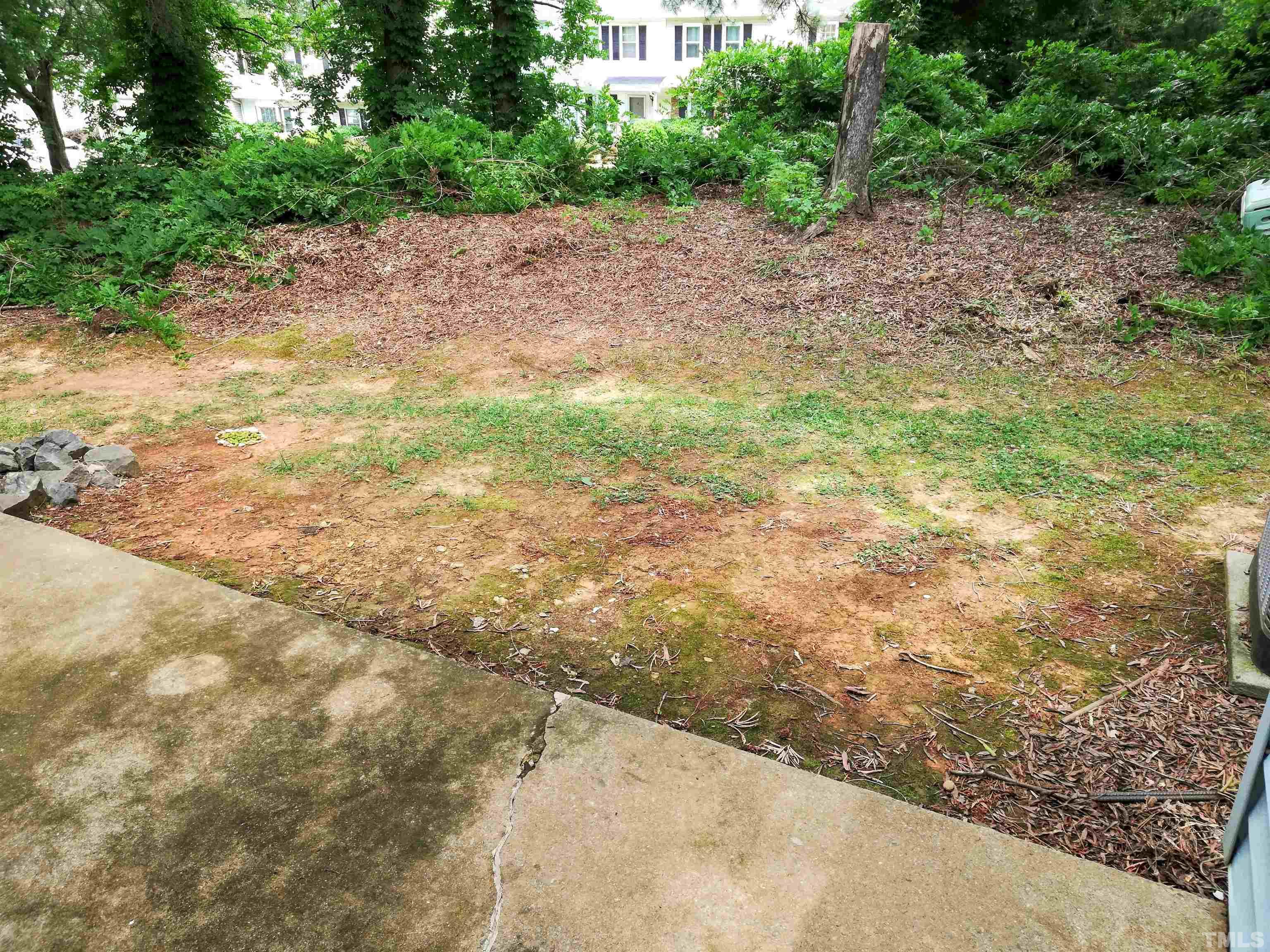 3 Prestwick Place Durham, NC 27705 - Photo 16 of 21 a view of a dirt road with trees in the background