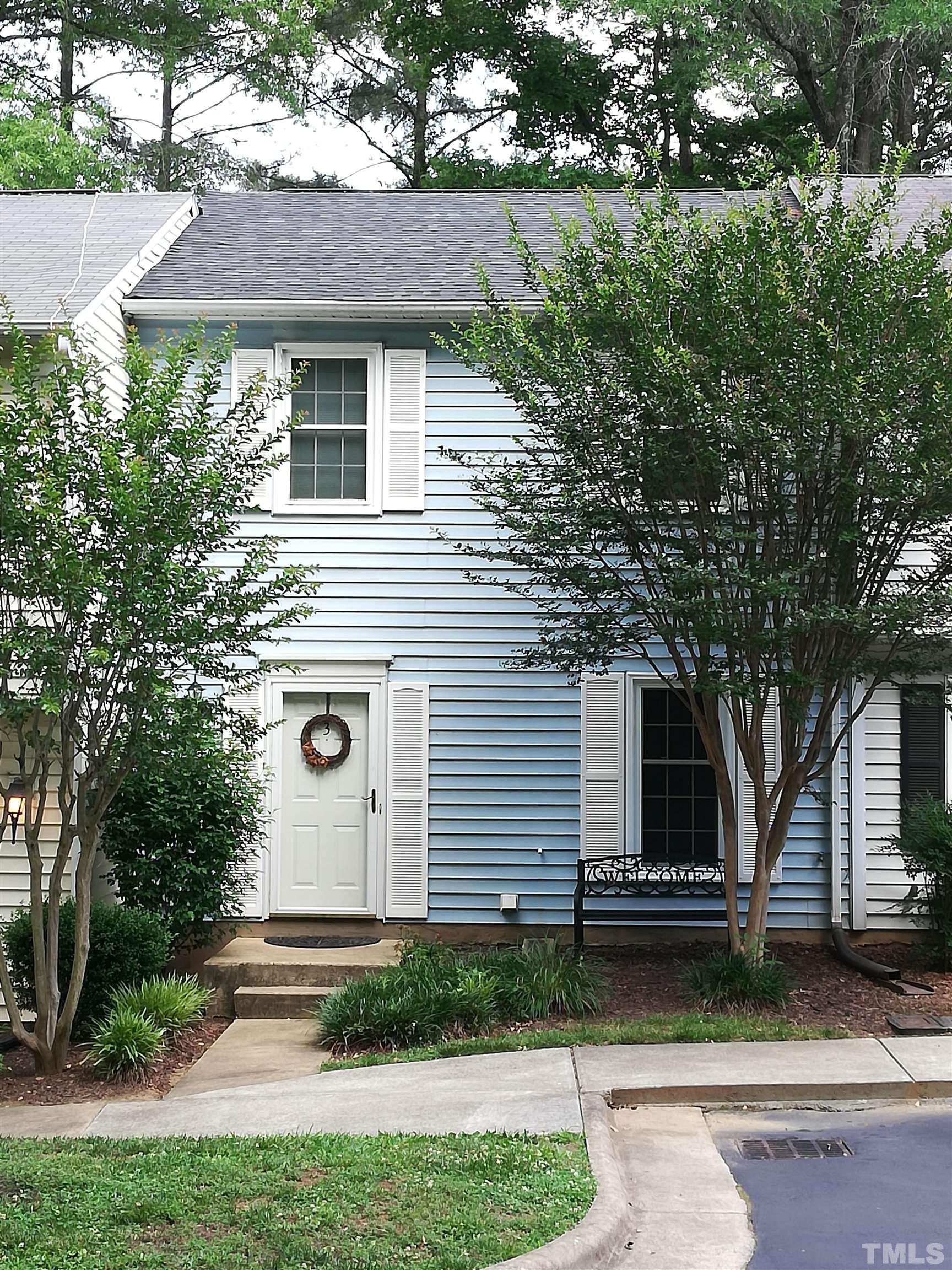 3 Prestwick Place Durham, NC 27705 - Photo 2 of 21 a front view of a house with garden