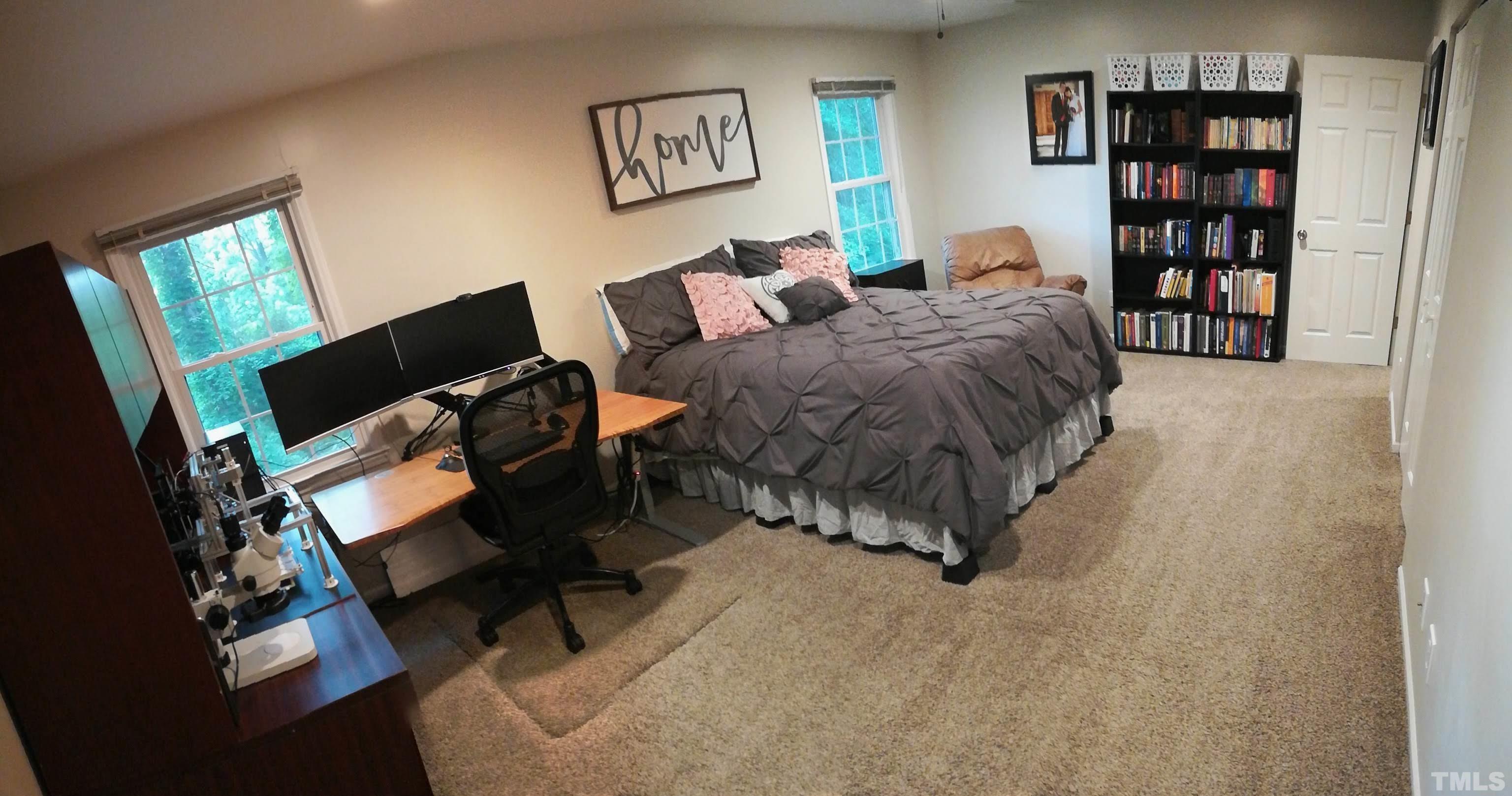 3 Prestwick Place Durham, NC 27705 - Photo 5 of 21 a living room with furniture and a book shelf