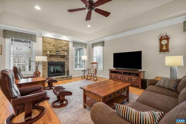 a living room with a bed and furniture