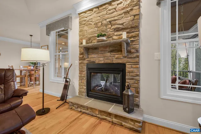 a spacious bathroom with a double vanity sink a large mirror and a bathtub