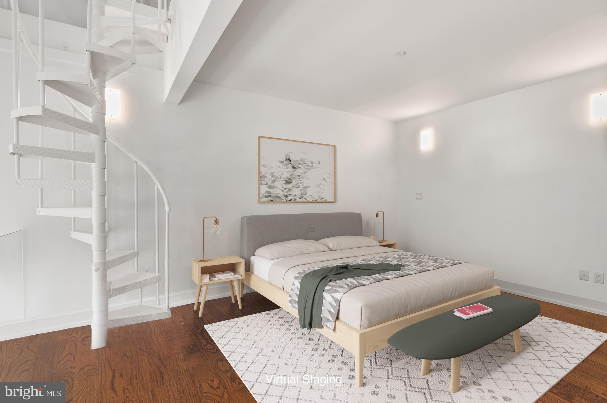 2747 Linden Lane, Unit 203 Silver Spring, MD 20910 - Photo 18 of 34 a bed sitting in a bedroom next to a window