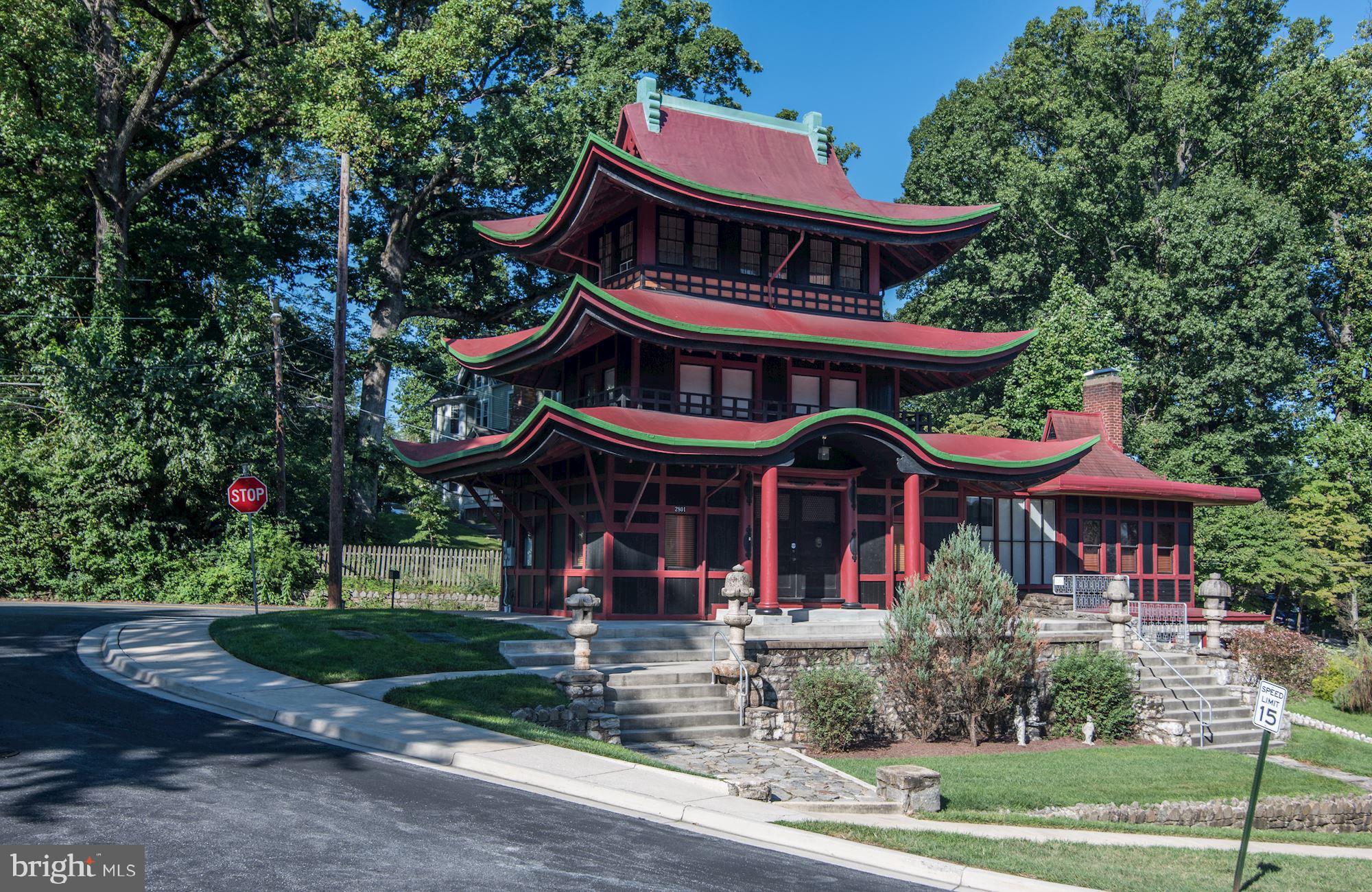 2747 Linden Lane, Unit 203 Silver Spring, MD 20910 - Photo 30 of 34 a front view of a house with yard and trees