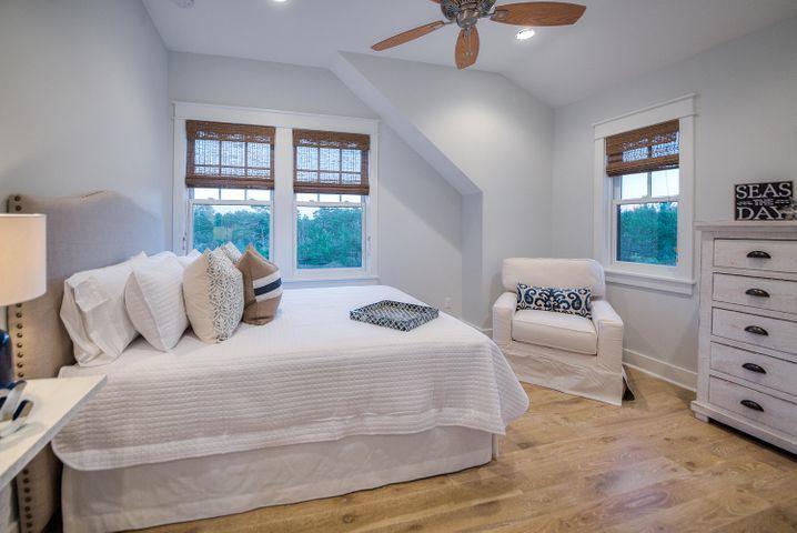 77 Shore Bridge Cir Inlet Beach Inlet Beach, FL 32461 - Photo 15 of 20 a bedroom with a bed and a dresser