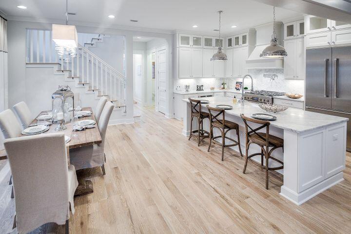 77 Shore Bridge Cir Inlet Beach Inlet Beach, FL 32461 - Photo 5 of 20 a large kitchen with a table and chairs