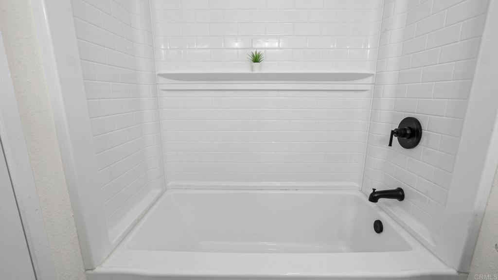 134 Espanas Escondido, CA 92026 - Photo 18 of 33 a bath tub sitting next to a white sink