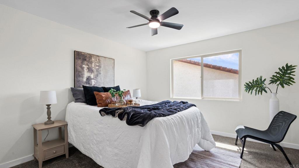 134 Espanas Escondido, CA 92026 - Photo 19 of 33 a bed room with a bed and a chair