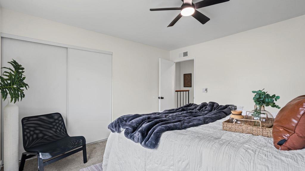 134 Espanas Escondido, CA 92026 - Photo 21 of 33 a bedroom with a bed and a chair