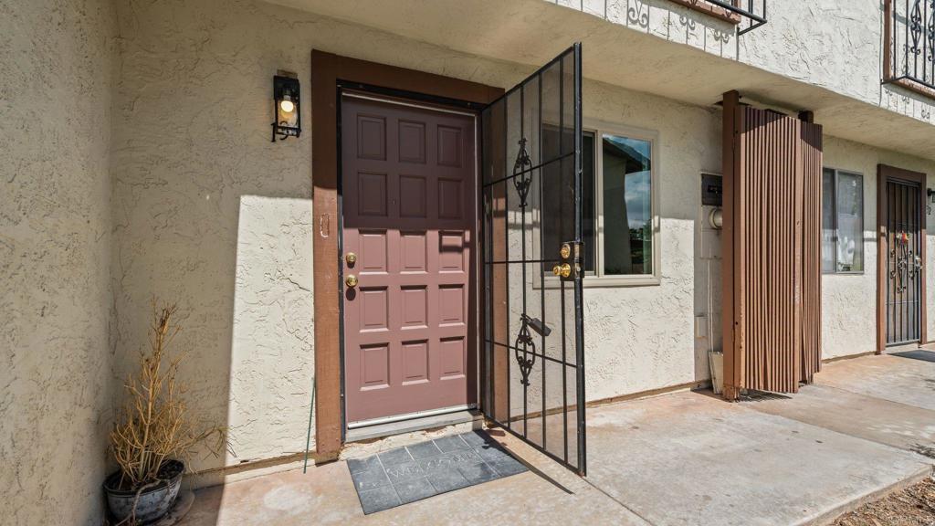 134 Espanas Escondido, CA 92026 - Photo 23 of 33 a view of a wooden door of the house