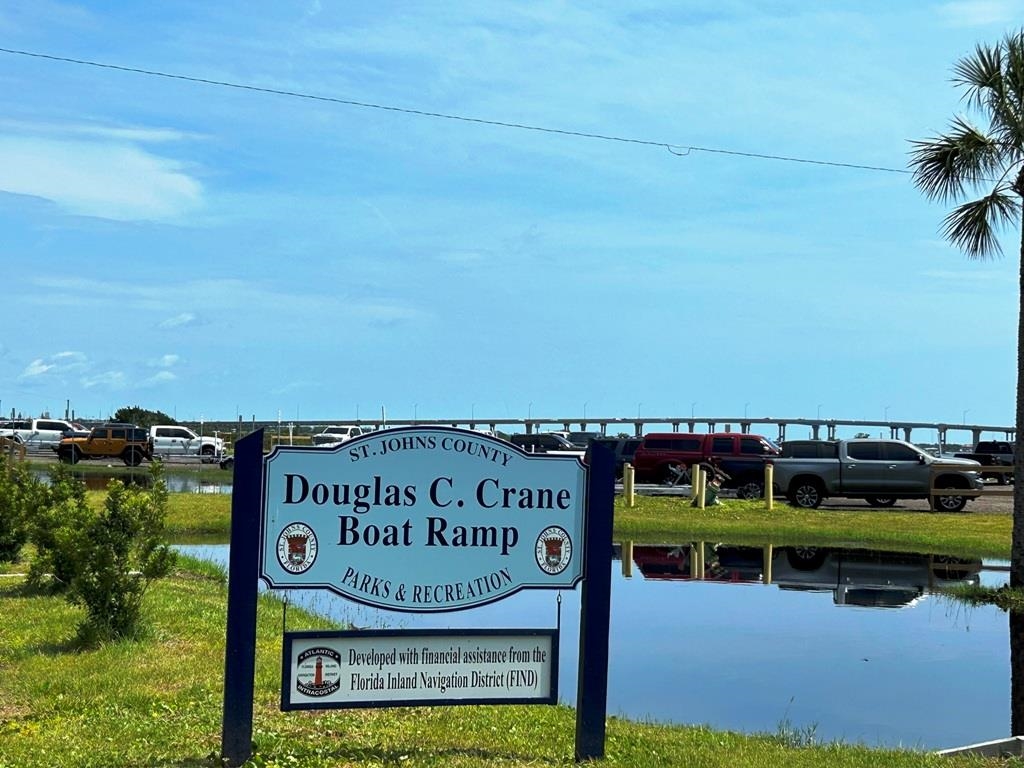 125 Saturn Road St. Augustine, FL 32086 - Photo 40 of 44 a sign on the side of the road