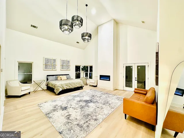 a living room with furniture large window and couch