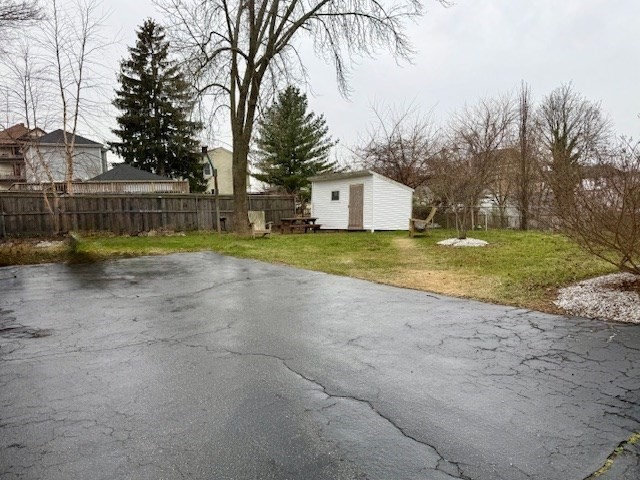 609 King Philip Street Fall River, MA 02724 - Photo 6 of 14 a view of a house with a yard and large trees