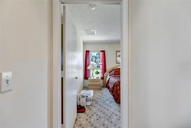 a view of a hallway with a couch