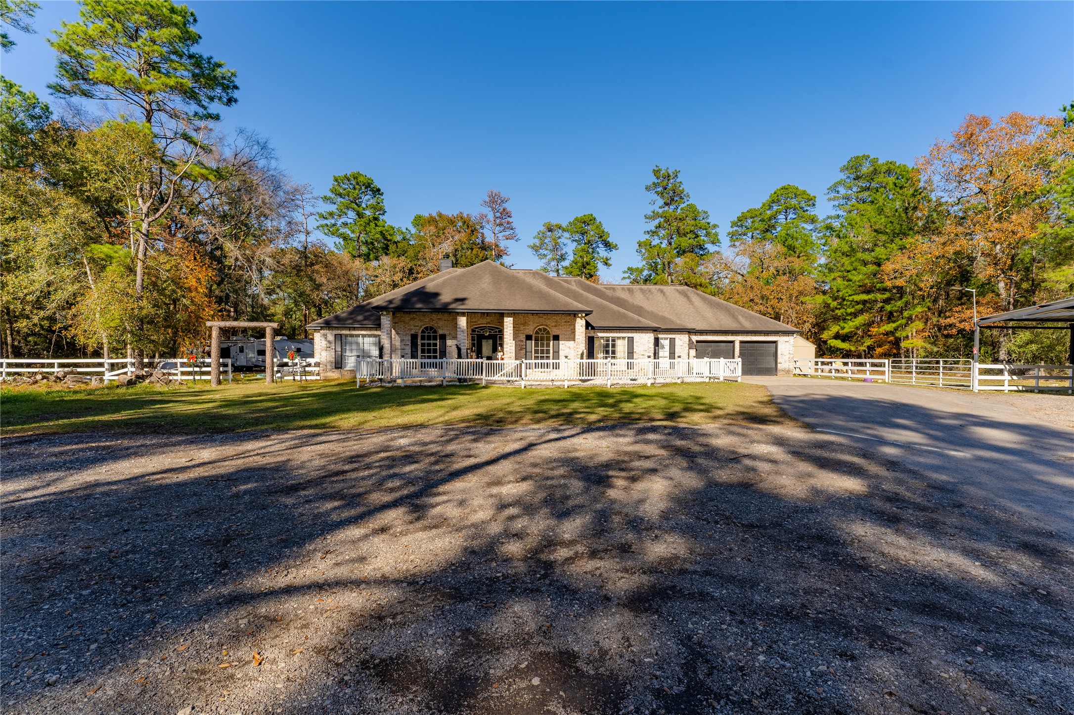 24102 Baneberry Road Magnolia, TX 77355 - Photo 34 of 39 a front view of a house with a garden