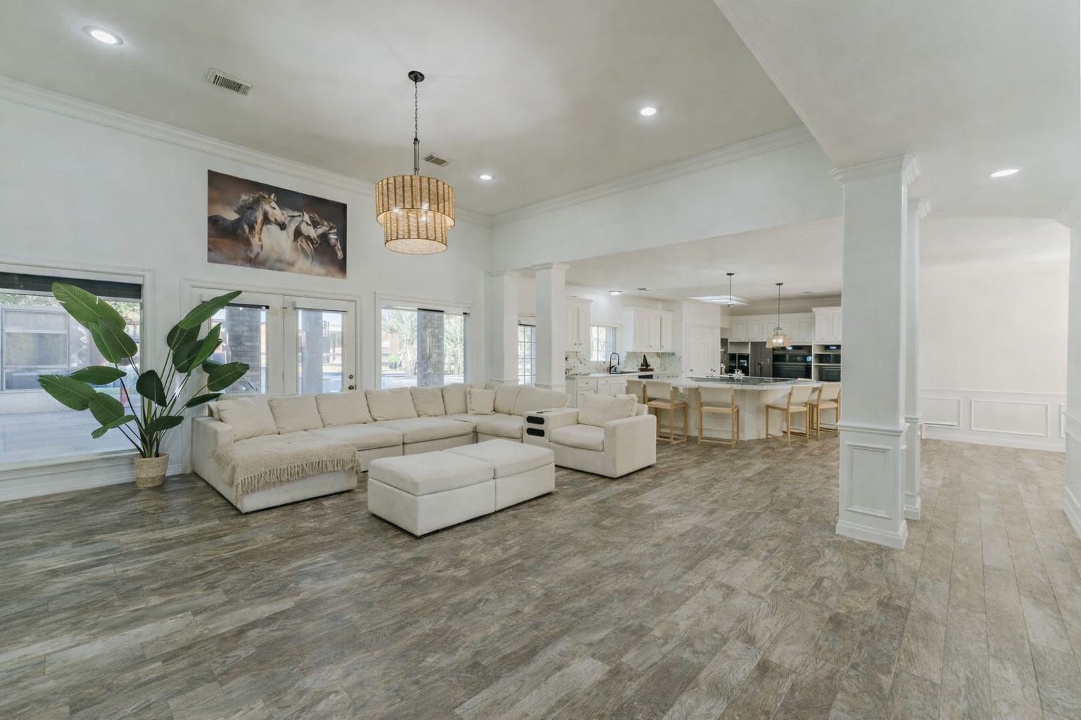 24102 Baneberry Road Magnolia, TX 77355 - Photo 6 of 39 a living room with fireplace furniture and a chandelier