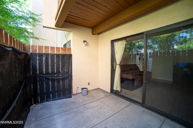 a view of a porch with wooden floor and outdoor space
