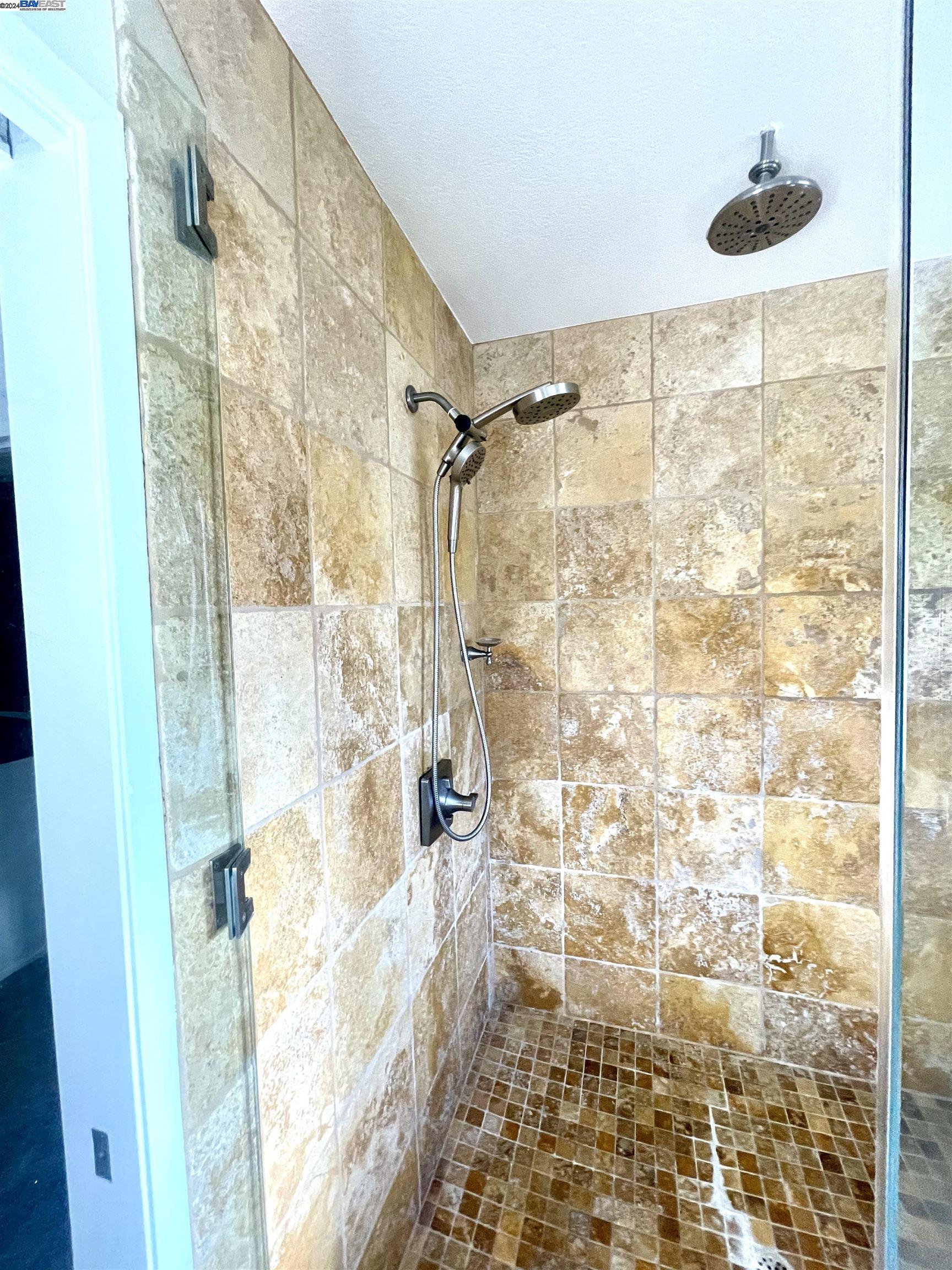 1361 Hudson Way Livermore, CA 94550 - Photo 17 of 23 a bathroom with a shower